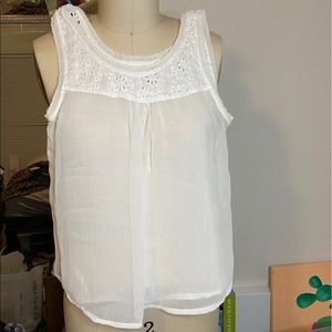 Cute sheer tank top with floral detail
